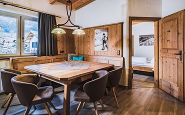 Kitchen and lounge area in apartment Type C, with private sauna in the Margarethenstein
