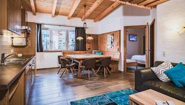 Appartementhaus & Panoramarestaurant Margarethenstein Küche und Wohnbereich im Apartment Typ C mit privater Sauna im Margarethenstein